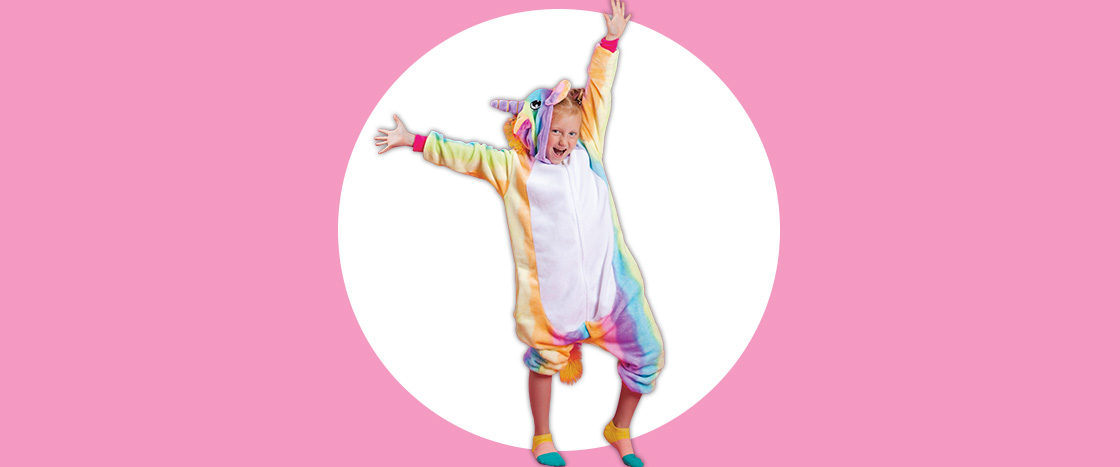 Image of a kid wearing a unicorn onesie